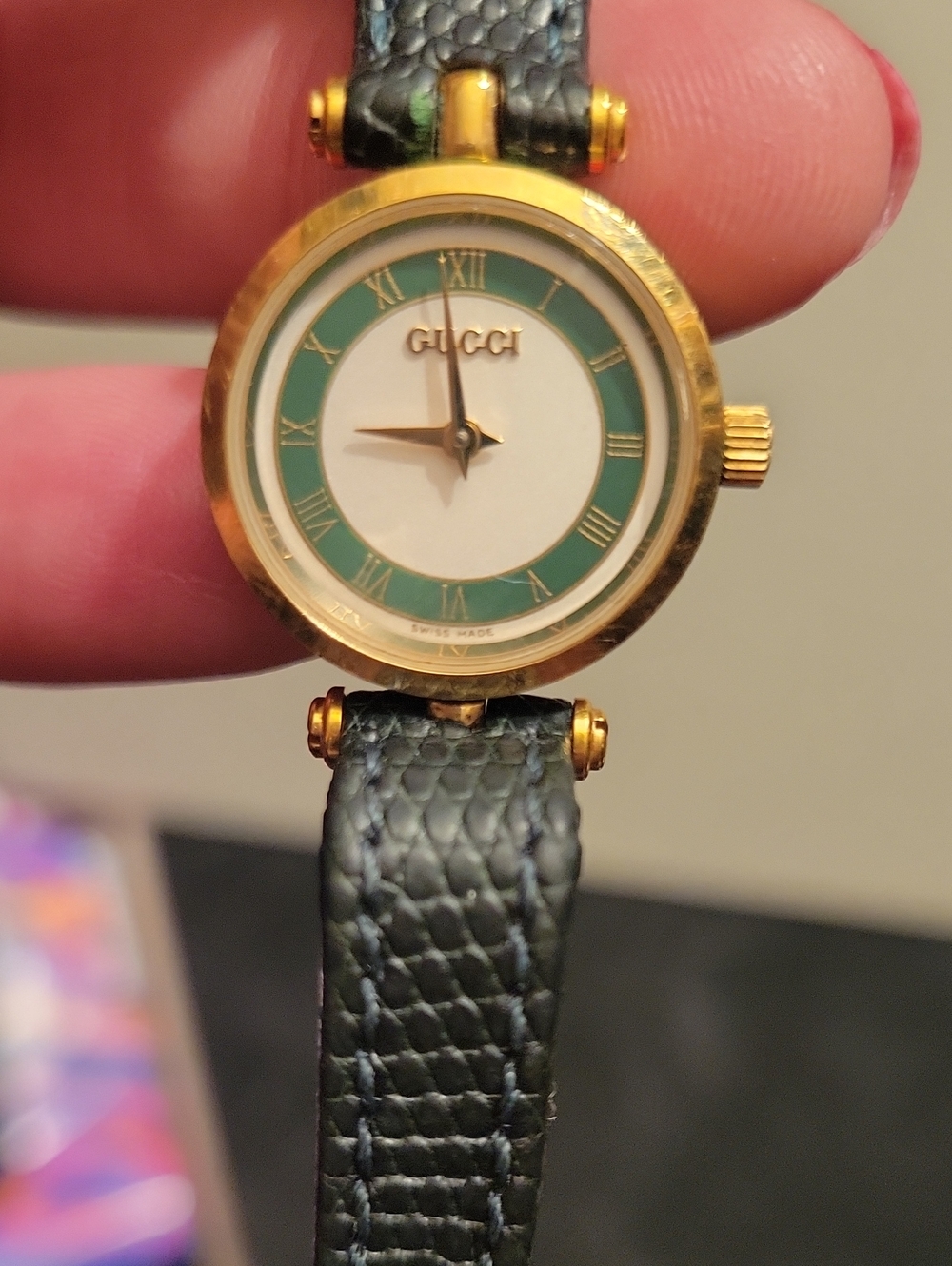 Gucci Gold-Tone Watch with Green Dial and Black Leather Strap